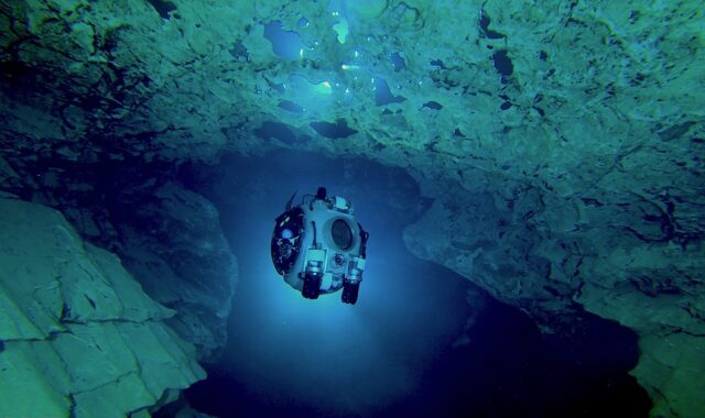 An underwater robot with a Nortek DVL navigates through the Molnár János cave system in Hungary